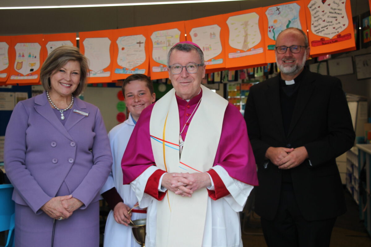 Bishop Michael McKenna officiates the official opening and blessing of new classrooms at St Mary's Catholic Primary School, Orange